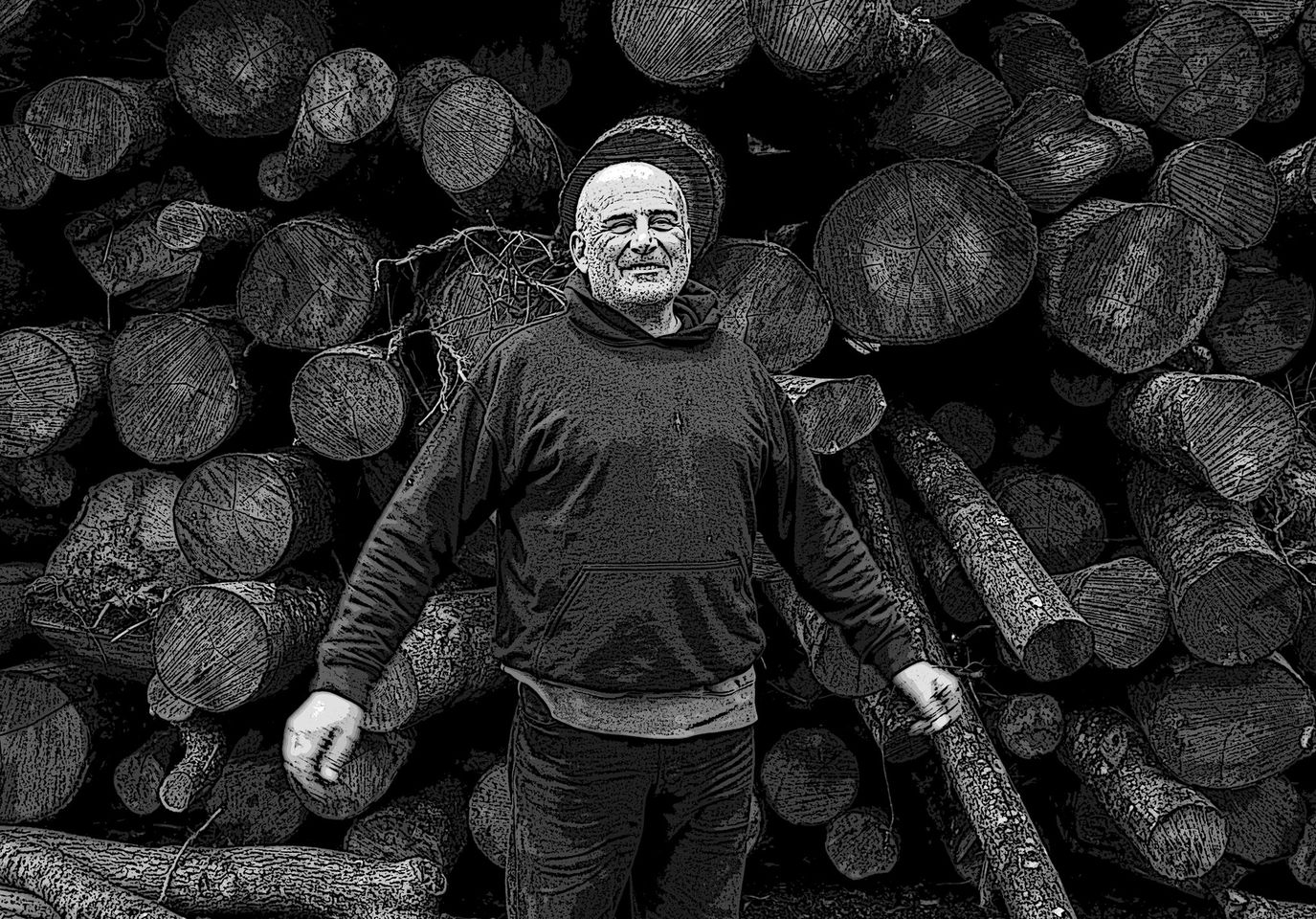 A black and white illustration of a man smiling in front of a pile of logs